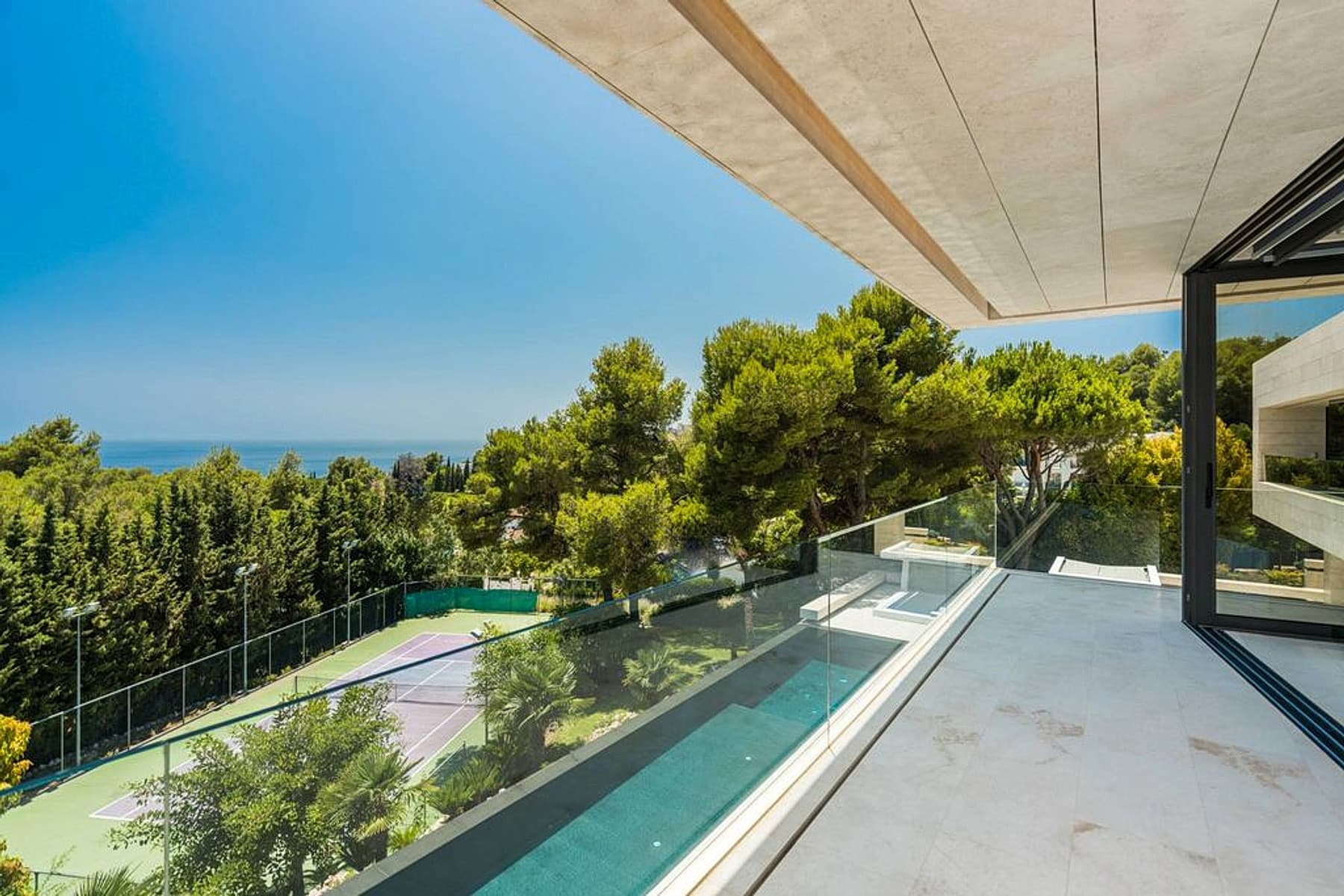 Bedroom terrace with sea and pool view